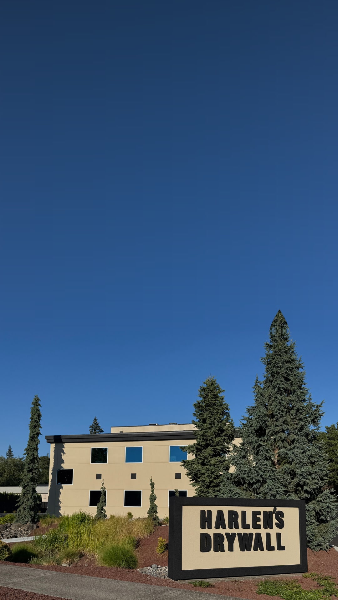 Harlen's Drywall Co. headquarters in Vancouver, Washington, with the company monument sign out front